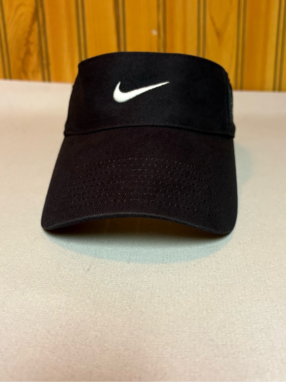 Nike Black Visor with White Swoosh Logo